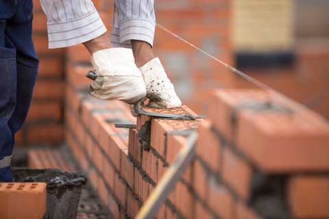 Bricklayer. Building Regulations for Extension Plans